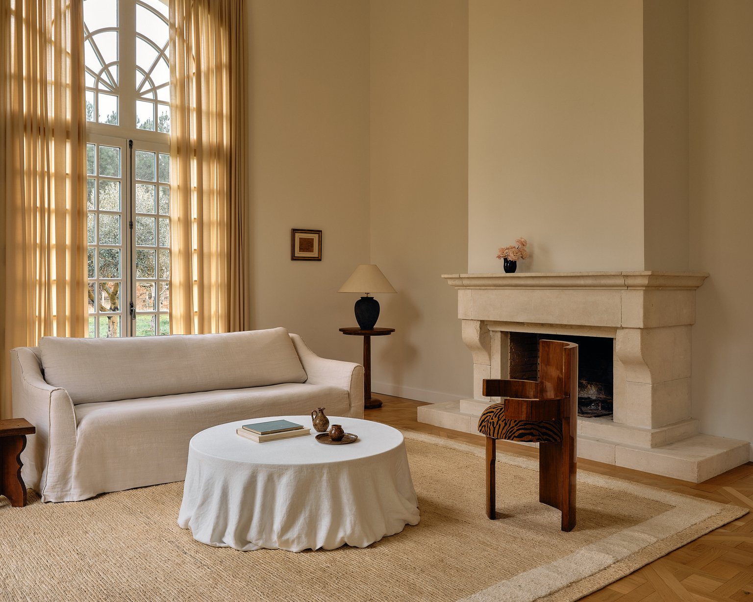 Warm minimalist living room with natural textures neutral colors and wooden furniture