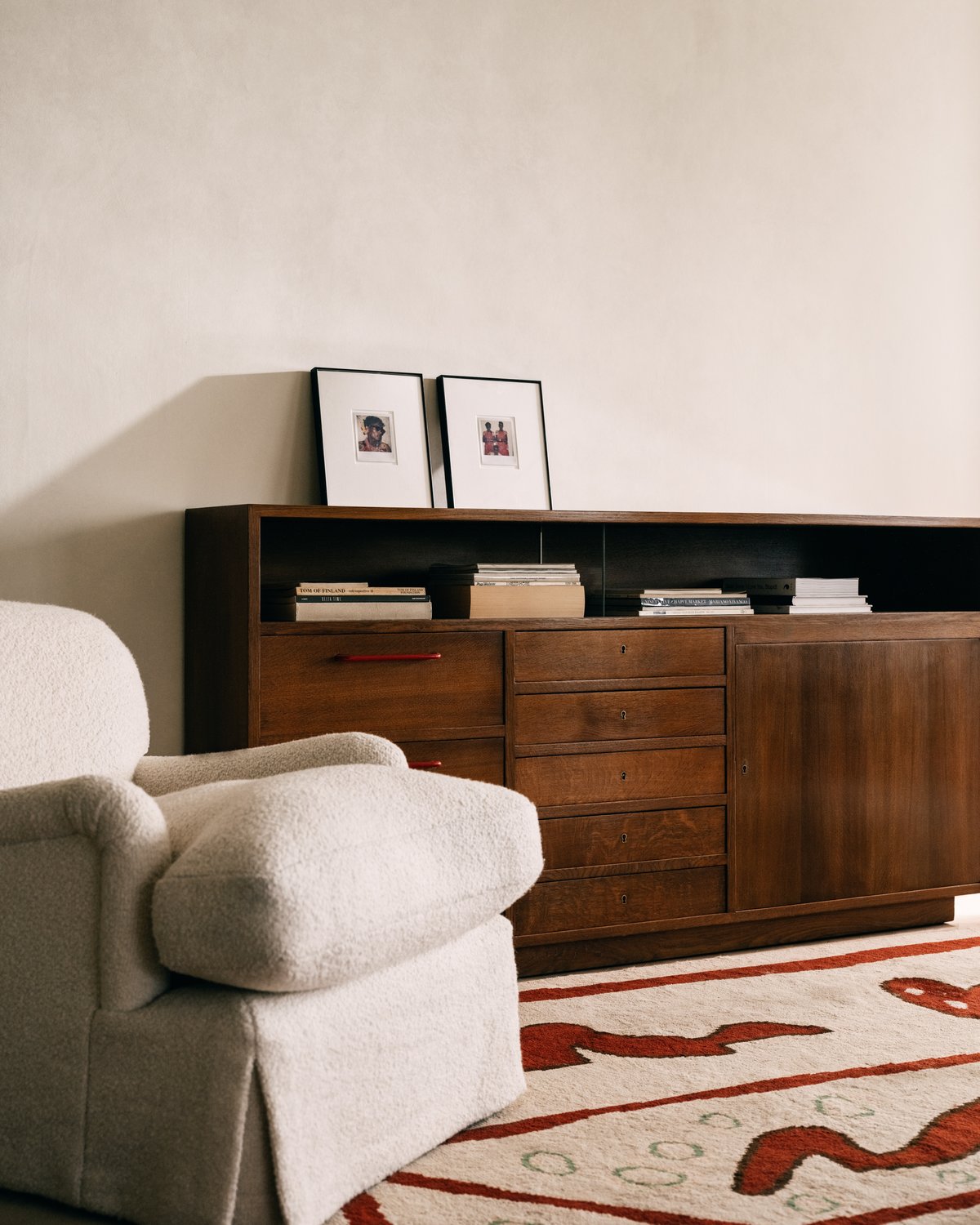 Wooden sideboard and cream armchair on the Walled Garden – Beige rug