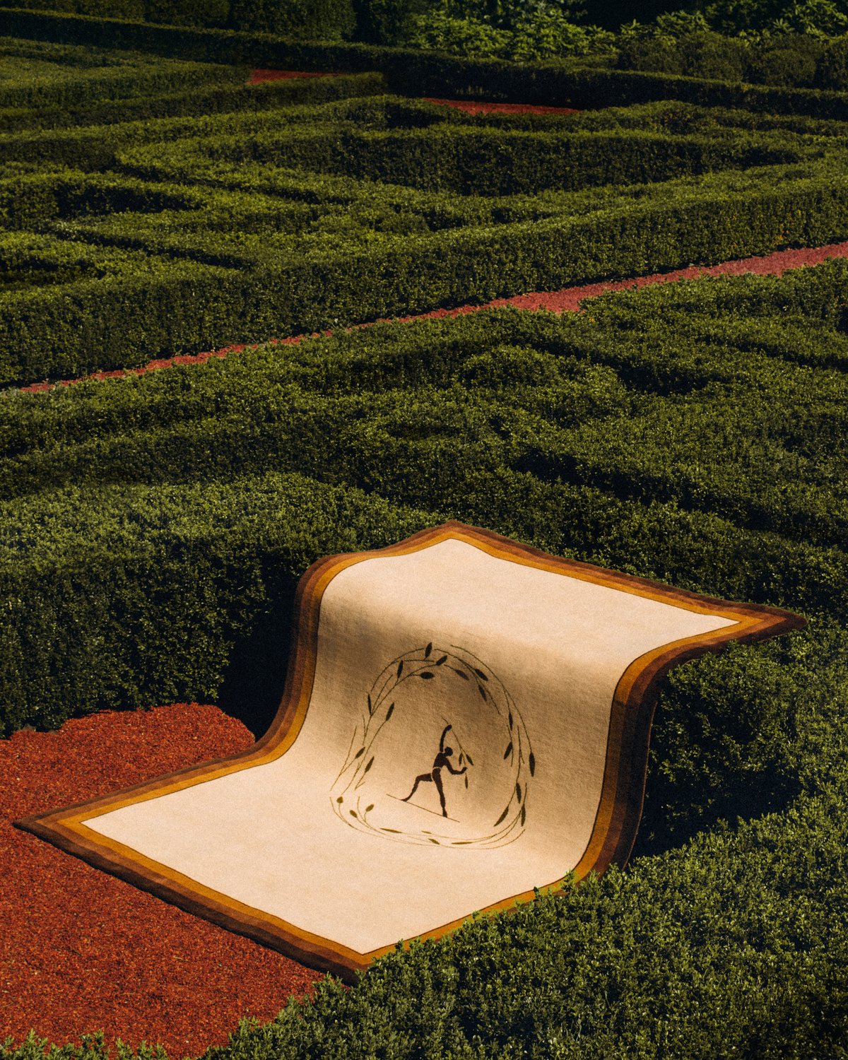 Plush wool rug Farmer by Fabrizio Casiraghi for Nordic Knots photographed spread out on a hedge in Norrvikens gardens.
