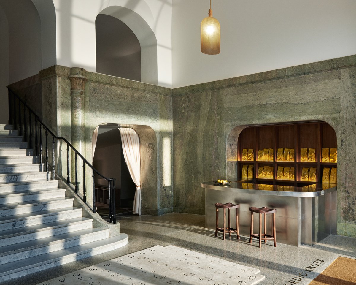 Nordic Knots showroom on Birger Jarlsgatan displaying the coffee bar with beautiful green marble on the walls.