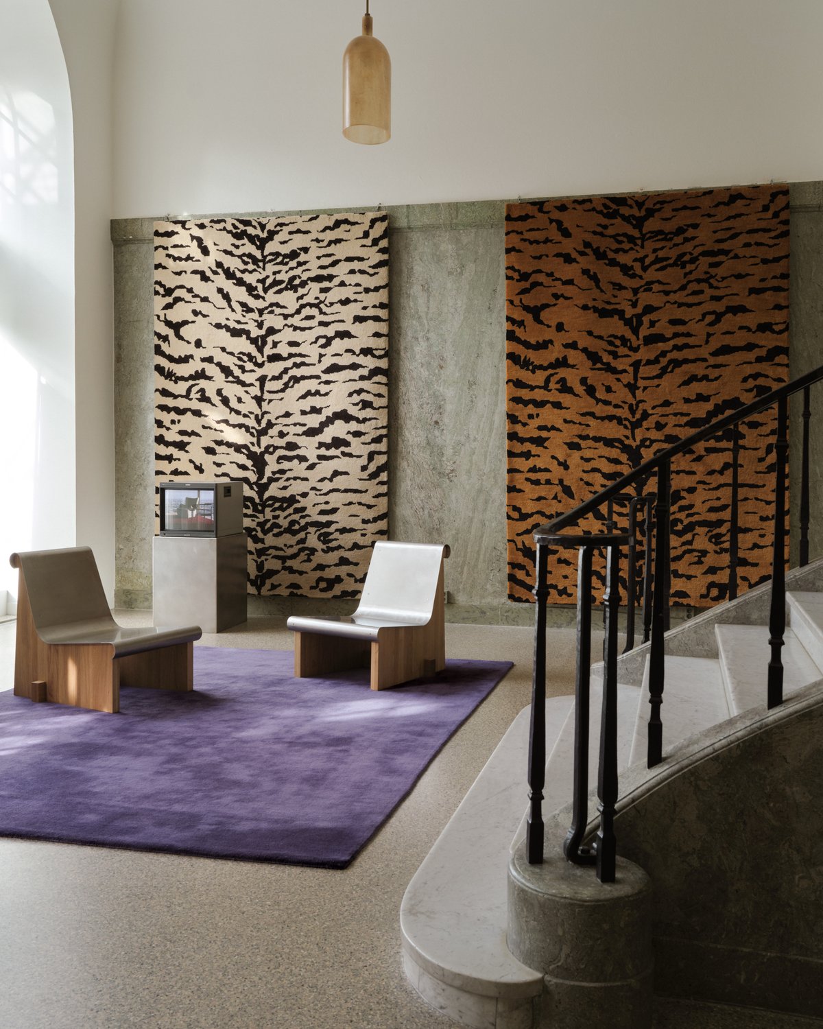 Nordic Knots showroom in Stockholm photographed featuring Grand in Lilac, Tigris in Brown/Beige and Tigris in Rust/Black.