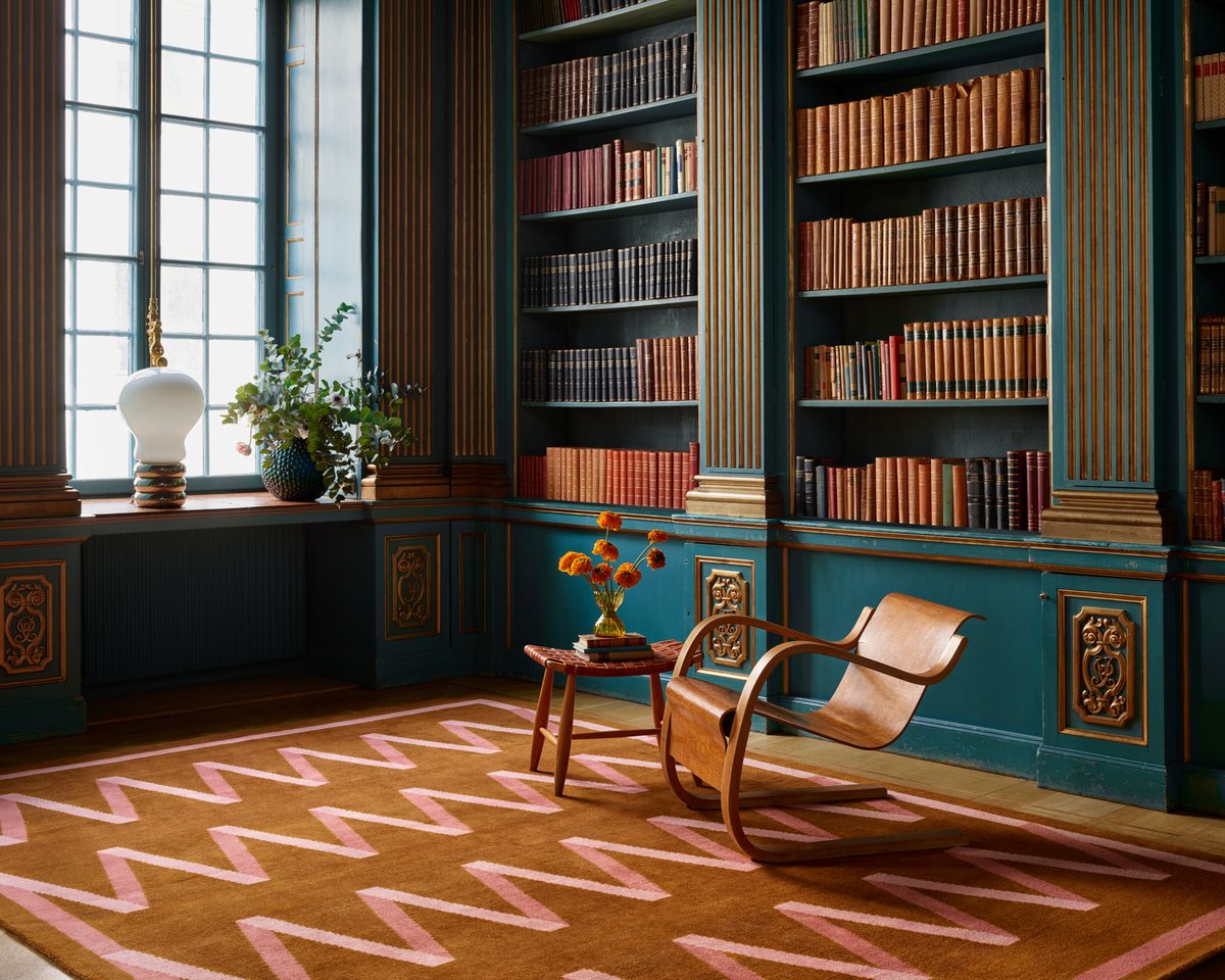 Colorful plush wool rug Folding Ribbon pictured in Van Der Nootska library.