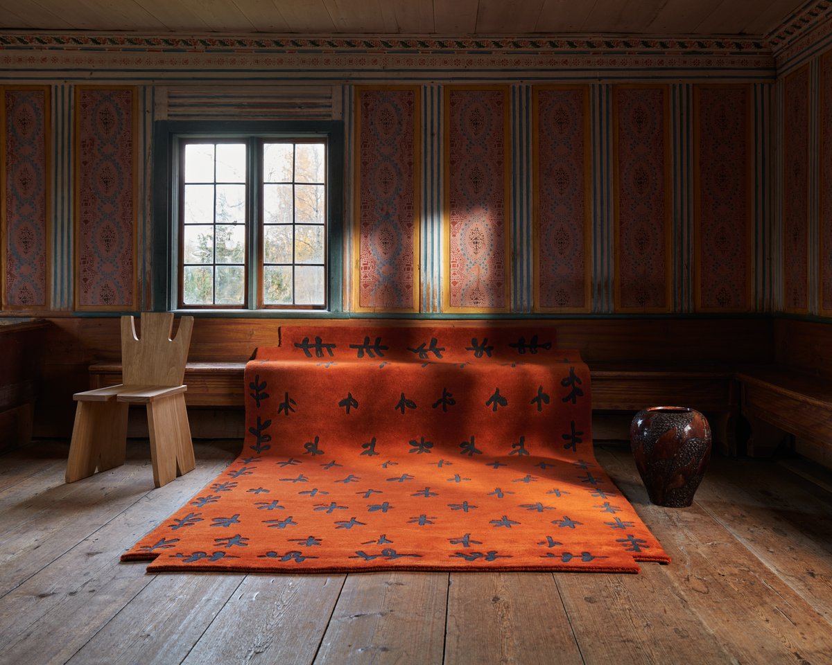 Big Buds rug pictured in a colorfully patterned room at Ol Anders Hälsingegård, Sweden.