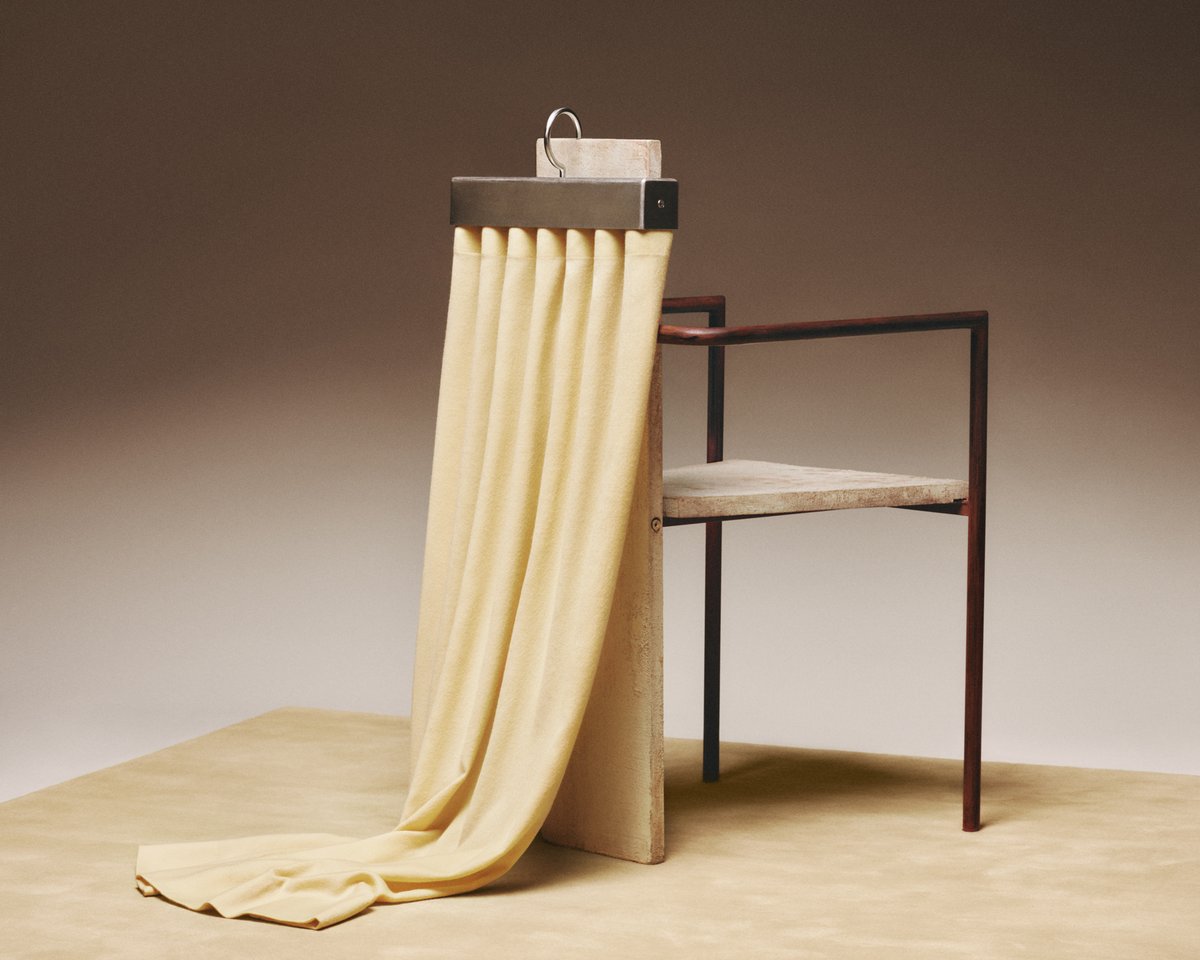 The Grand wool curtain in Sunrise paired with the Grand rug in Butter.