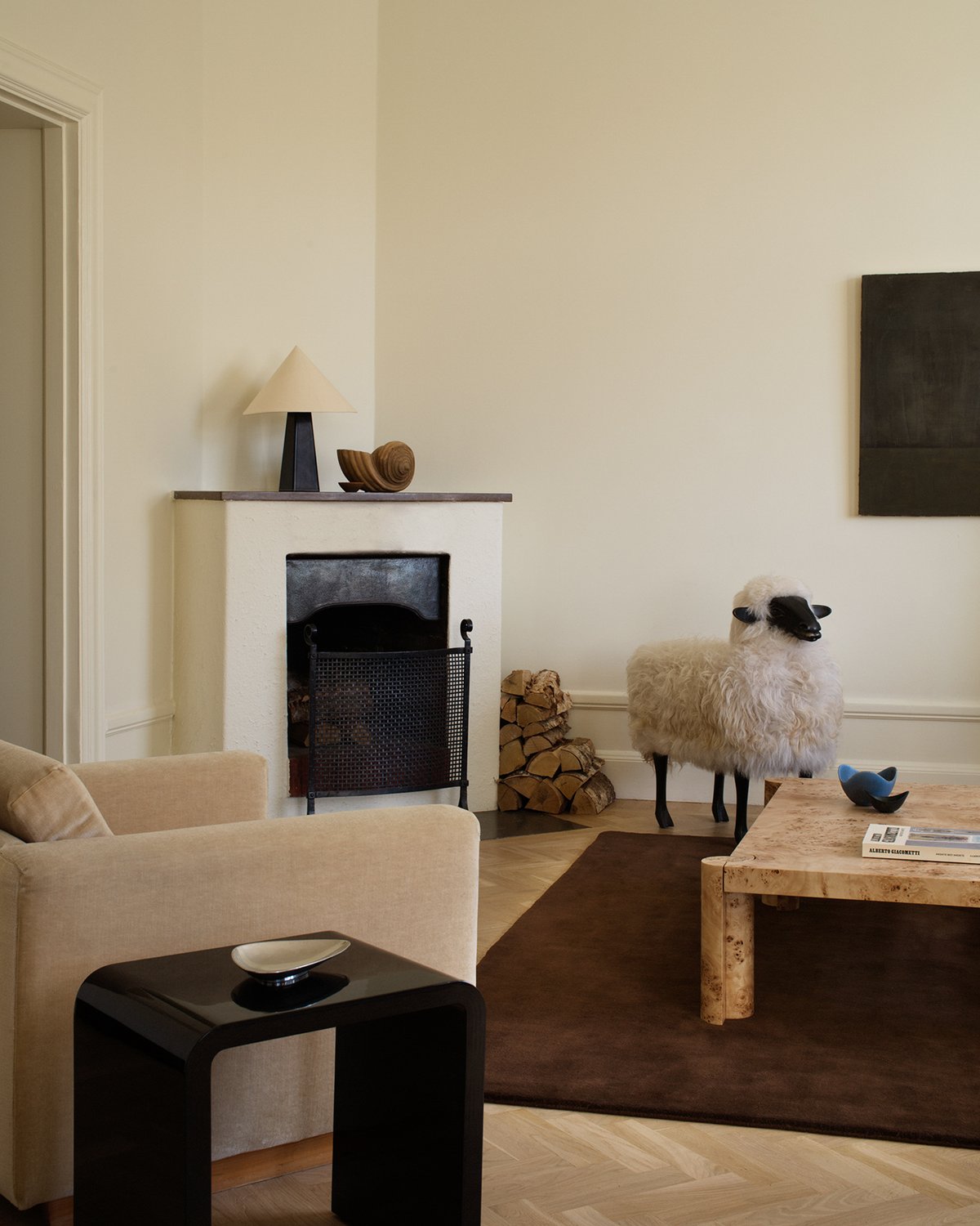 Plush wool rug Grand in the color walnut styled in a beautiful home with vintage interior details