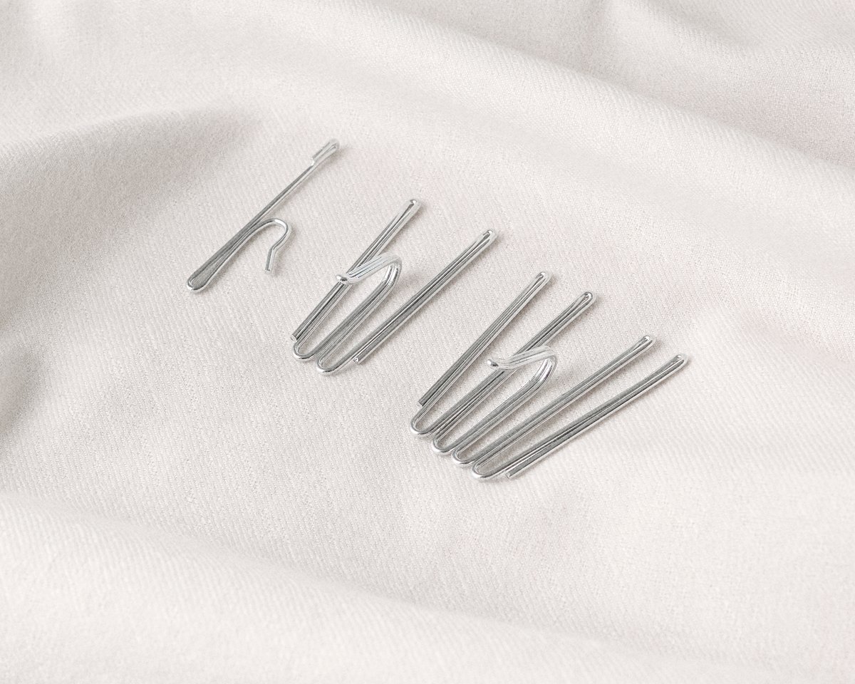 An image of the three different options of curtain hooks. 1-finger hooks, 2-finger hooks and 4-finger hooks.