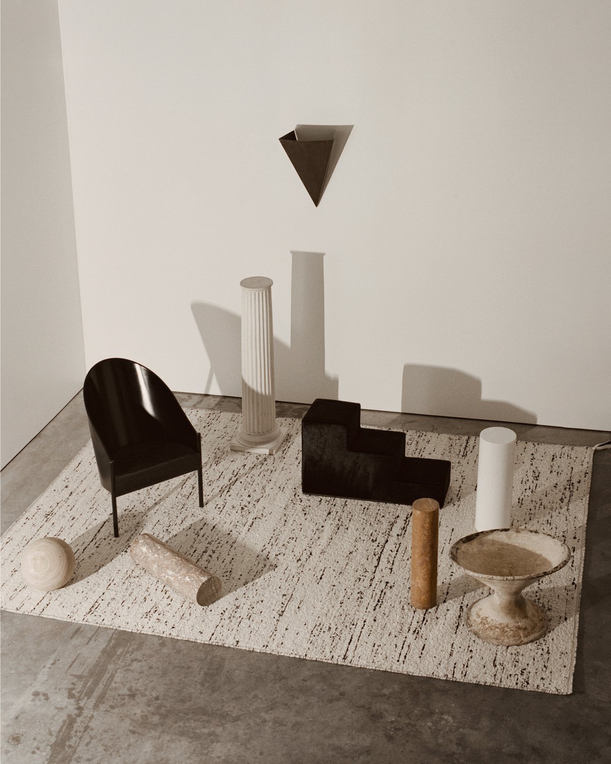 Bouclé in black and white shot from above displayed with black and white interior details