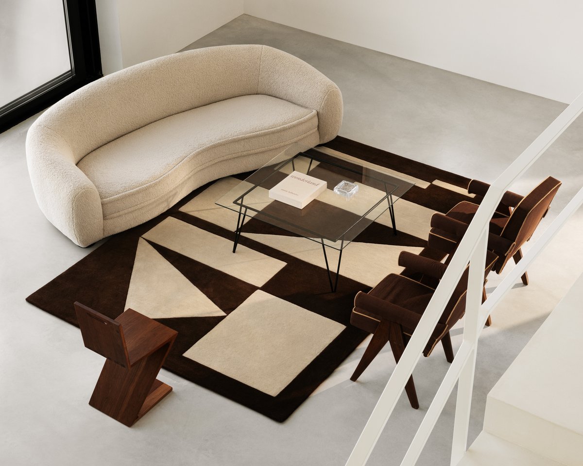 Aerial view of a modern living room with the brown Untitled 3 – Walnut rug.